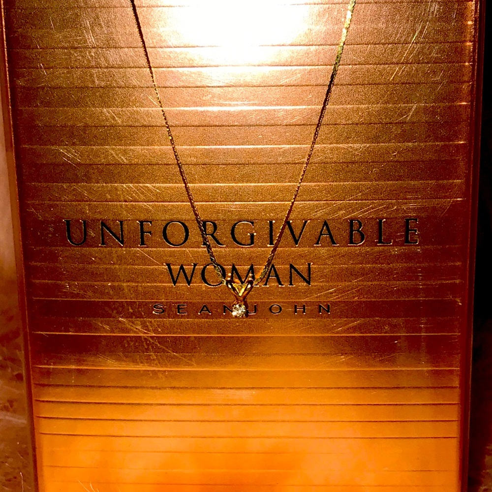 14kt gold diamond pendant on a 16 inch chain